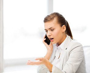 Image showing woman shouting into smartphone