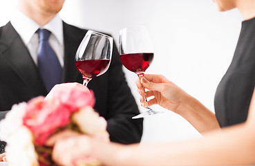 Image showing engaged couple with wine glasses