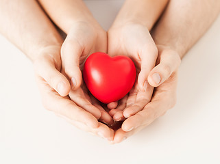 Image showing woman and man hands with heart