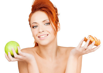 Image showing pretty woman with apple and cake
