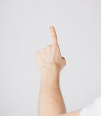 Image showing man hand pointing at something