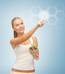 Image showing woman with salad and virtual screen