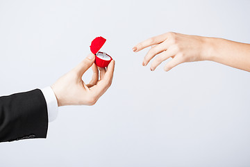 Image showing couple with wedding ring and gift box