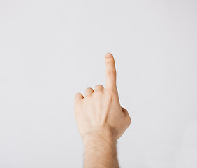 Image showing man hand pointing at something