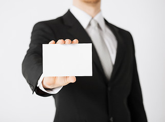 Image showing man hand with blank paper