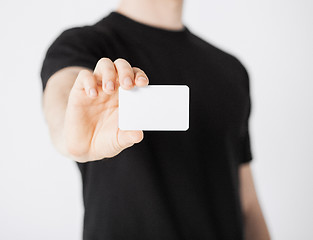 Image showing man hand with blank paper