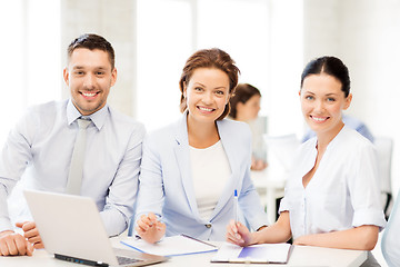 Image showing business team discussing something in office