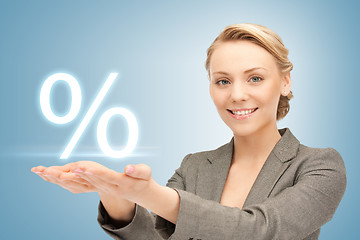 Image showing woman showing sign of percent in her hands