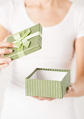 Image showing woman hands with gift box