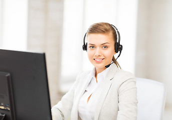 Image showing friendly female helpline operator