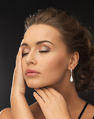 Image showing woman wearing diamond earrings