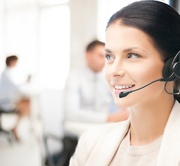 Image showing female helpline operator in call center