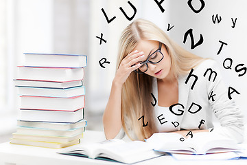 Image showing student with books and notes