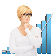 Image showing businesswoman with colorful 3d graphics