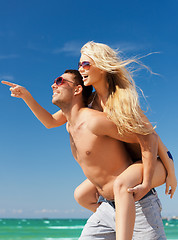 Image showing couple having fun on the beach