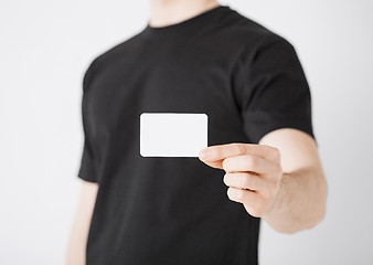 Image showing man hand with blank paper