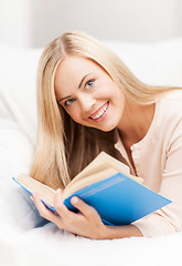 Image showing woman reading book