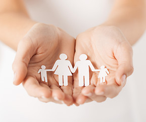 Image showing womans hands with paper man family