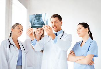 Image showing young group of doctors looking at x-ray