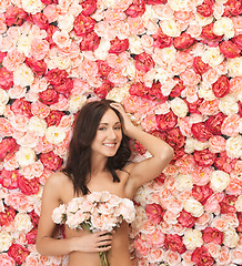 Image showing woman and background full of roses