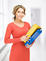 Image showing woman with folders