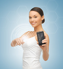 Image showing woman showing smartphone with app