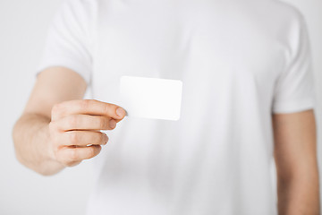 Image showing man hand with blank paper