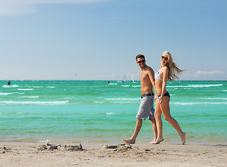 Image showing couple walking on the beach