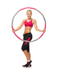 Image showing young sporty woman with hula hoop