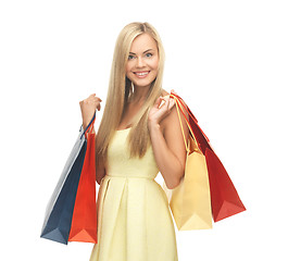 Image showing excited woman with shopping bags