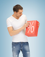 Image showing man with big percent box