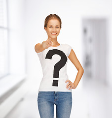 Image showing woman in white t-shirt pointing at you