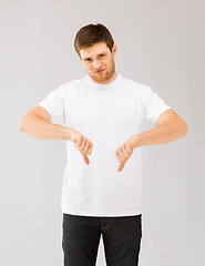 Image showing man showing thumbs down