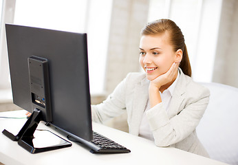 Image showing businesswoman with computer in office