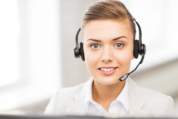 Image showing friendly female helpline operator