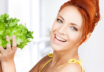 Image showing woman holding lettuce