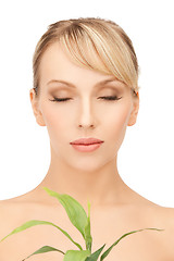 Image showing woman with green sprout