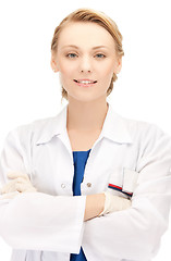 Image showing smiling female doctor in uniform