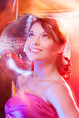 Image showing woman with disco ball