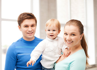 Image showing happy family with adorable baby