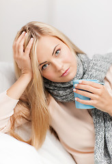 Image showing diseased woman with cup of tea