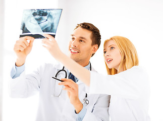 Image showing two doctors looking at x-ray