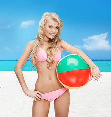 Image showing beautiful woman in bikini with beach ball