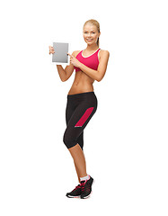 Image showing sporty woman with tablet pc