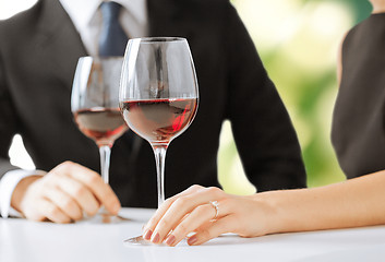 Image showing engaged couple with wine glasses