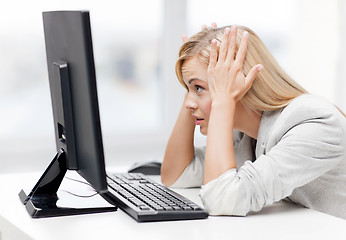 Image showing stressed woman with computer