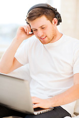 Image showing man with headphones listening to music