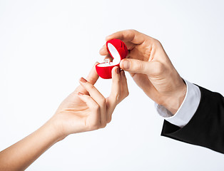 Image showing couple with wedding ring and gift box