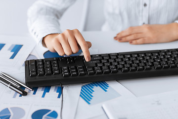 Image showing woman hand pressing enter button on keyboard