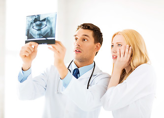 Image showing two doctors looking at x-ray